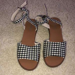 Black and white checkered sandals.